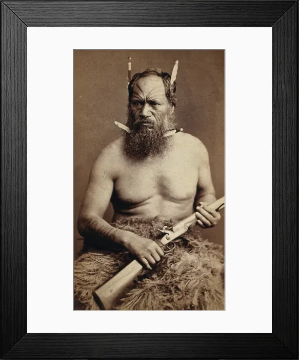 Framed Print : A Maori man with a tattoed face, holding a rifle, c1870s. Creator: James Bragge Framed Print : A Maori man with a tattoed face, holding a rifle, c1870s. Creator: James Bragge