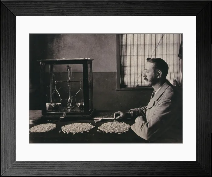 Framed Print : South Africa: an employee of De Beers counting the diamonds mined that day, 1896. Creator: Unknown Framed Print : South Africa: an employee of De Beers counting the diamonds mined that day, 1896. Creator: Unknown