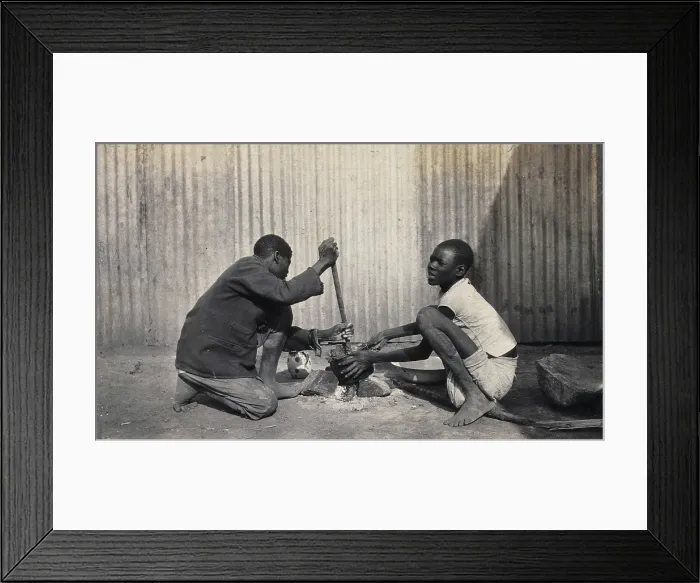 Framed Print : Umtali, Zimbabwe: two African boys stirring a cooking pot, 1905. Creator: J Lomas Framed Print : Umtali, Zimbabwe: two African boys stirring a cooking pot, 1905. Creator: J Lomas