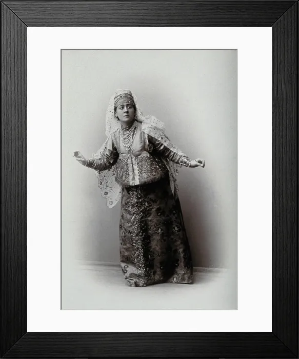 Framed Print : A woman posing in a photographic studio, wearing an embriodered dress, c1900s. Creator: Unknown Framed Print : A woman posing in a photographic studio, wearing an embriodered dress, c1900s. Creator: Unknown