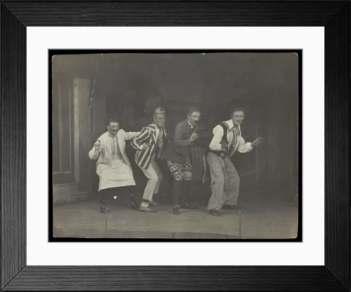 Framed Print : Sailors on stage in mid-pose, wearing a variety of costumes, [between 1910 and 1919?]. Creator: Unknown
