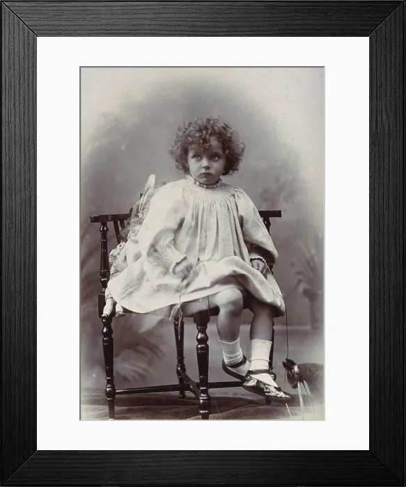 Framed Print : Nora Schuster aged 3, seated, facing forwards, c1895. Creator: Mrs Fred Wilkinson Framed Print : Nora Schuster aged 3, seated, facing forwards, c1895. Creator: Mrs Fred Wilkinson