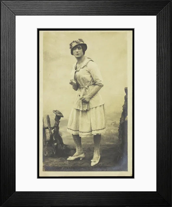 Framed Print : An actor, in drag, performing English theatre at a prisoner of war camp in Cottbus, [1910-1919?]. Creator: Unknown