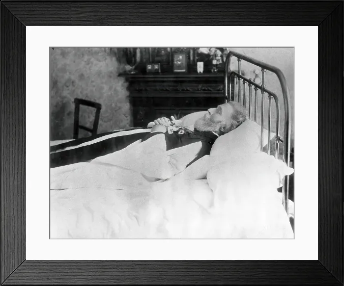 Framed Print : A dead man, wearing robes, lying on his deathbed, (1900?). Creator: Unknown Framed Print : A dead man, wearing robes, lying on his deathbed, (1900?). Creator: Unknown