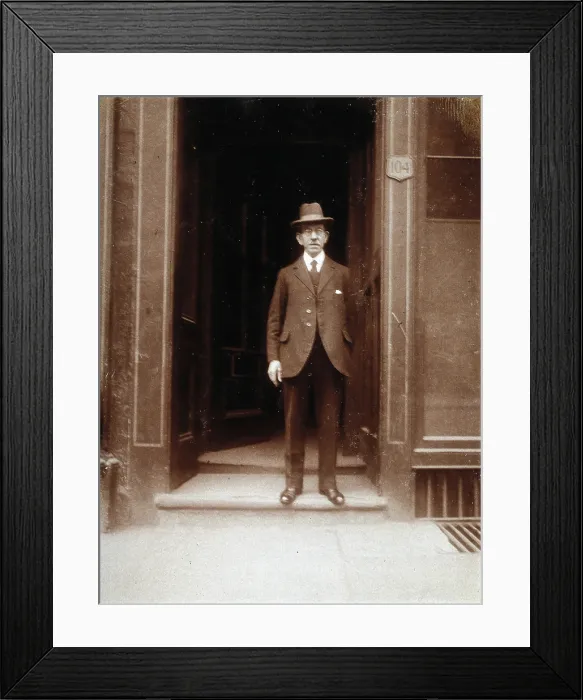 Framed Print : An unidentified man standing in a doorway, 1926. Creator: William Brown Framed Print : An unidentified man standing in a doorway, 1926. Creator: William Brown
