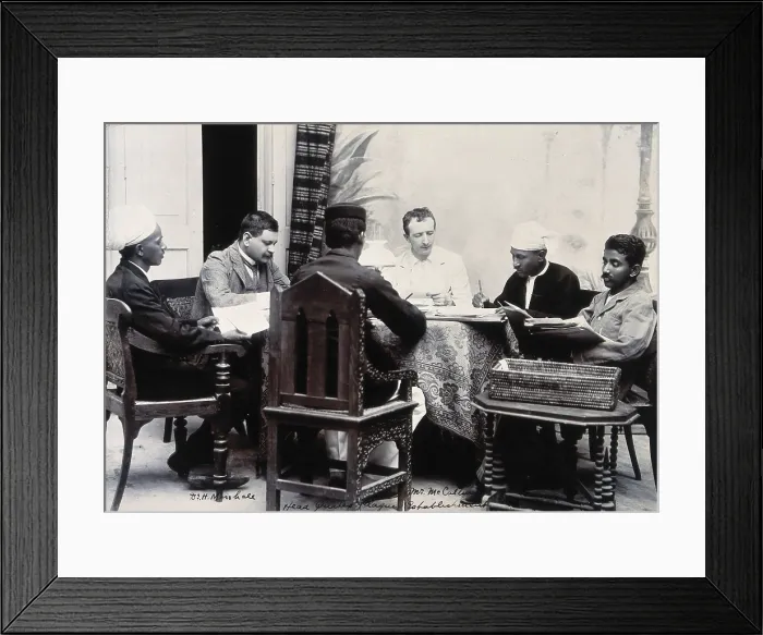 Framed Print : A group of men taking notes at a table, during a plague epidemic in Mandalay, 1906. Creator: Unknown