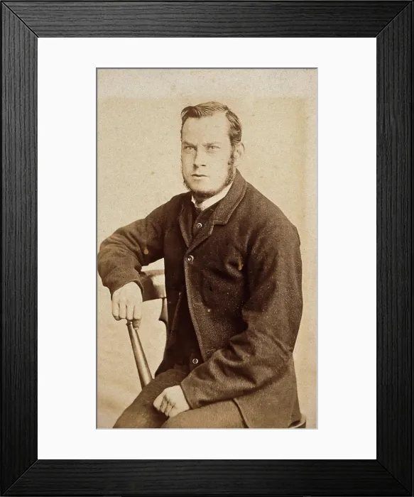 Framed Print : A young man, seated, with an intense expression in his eyes, c1890s. Creator: John Davis Framed Print : A young man, seated, with an intense expression in his eyes, c1890s. Creator: John Davis