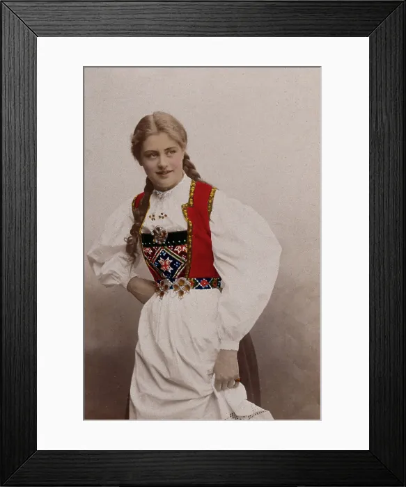 Framed Print : A young Norwegian woman, posing in a photographic studio wearing peasant dress, 1901. Creator: Sostrene Persen Framed Print : A young Norwegian woman, posing in a photographic studio wearing peasant dress, 1901. Creator: Sostrene Persen