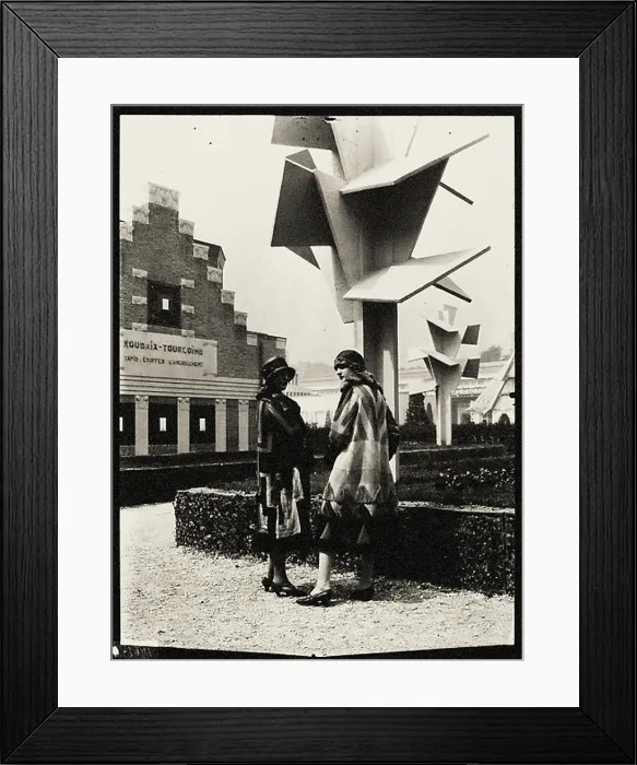 Framed Print : Models wearing dresses by Sonia Delaunay in front of the Arbre Cubiste (Cubist Tree) by the... 1925 Creator: Mallet-Stevens, Robert (1886-1945) Framed Print : Models wearing dresses by Sonia Delaunay in front of the Arbre Cubiste (Cubist Tree) by the... 1925 Creator: Mallet-Stevens, Robert (1886-1945)