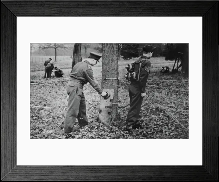 Framed Print : Demonstration of how to place limpet mines, c1943. Creator: British Government Framed Print : Demonstration of how to place limpet mines, c1943. Creator: British Government