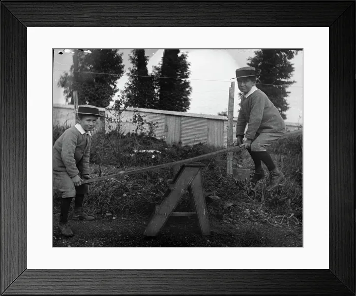 Framed Print : Frederick Robert L'Estrange on a see saw, c1895. Creator: Robert Augustus Henry L'Estrange. Frederick Robert L'Estrange on a see saw, c1895 Framed Print : Frederick Robert L'Estrange on a see saw, c1895. Creator: Robert Augustus Henry L'Estrange. Frederick Robert L'Estrange on a see saw, c1895