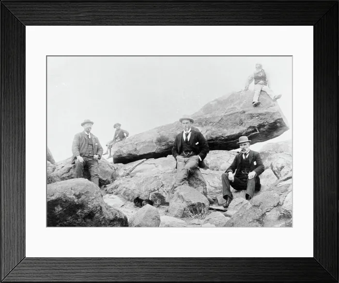 Framed Print : Unknown men and boy, unknown location posing on large rocks, c1900s Framed Print : Unknown men and boy, unknown location posing on large rocks, c1900s