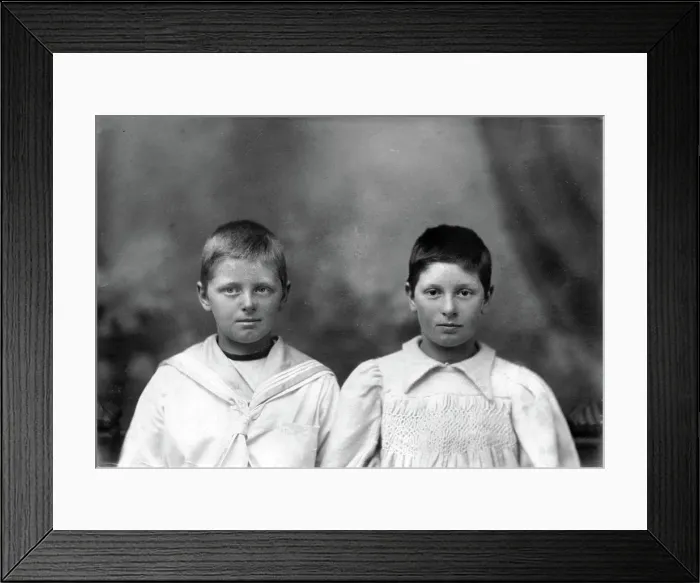 Framed Print : Portrait of two unknown siblings (brother and sister), c1900s. Creator: Robert Augustus Henry L'Estrange. Portrait of two unknown siblings (brother and sister), c1900s Framed Print : Portrait of two unknown siblings (brother and sister), c1900s. Creator: Robert Augustus Henry L'Estrange. Portrait of two unknown siblings (brother and sister), c1900s