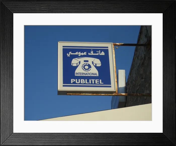 Framed Print : International phone call sign, Sousse, Tunisia, 2009. Creator: Amanda Waite Framed Print : International phone call sign, Sousse, Tunisia, 2009. Creator: Amanda Waite
