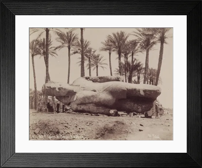 Framed Print : Statue of Ramesses II Resting on Its Side at Memphis, 19th century. Creator: Pascal Sebah Framed Print : Statue of Ramesses II Resting on Its Side at Memphis, 19th century. Creator: Pascal Sebah