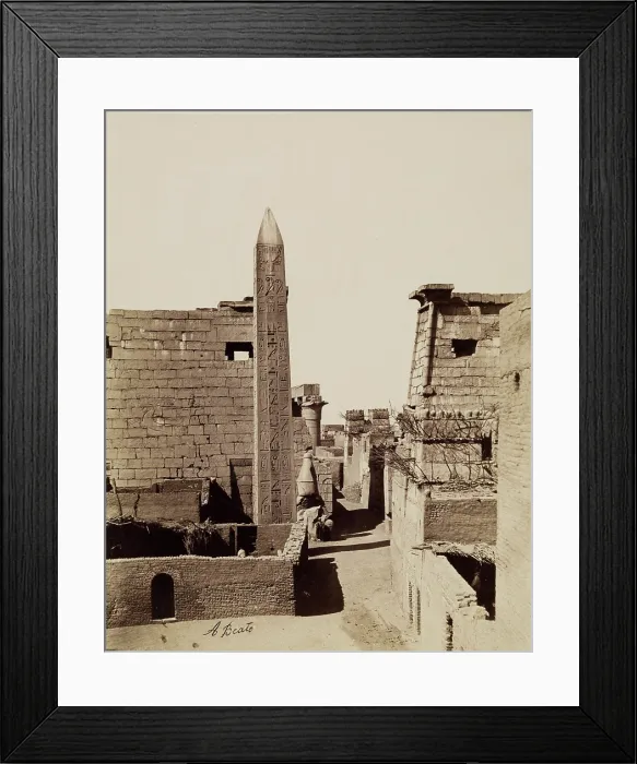 Framed Print : Entrance to Temple of Luxor with Modern Mud-Brick Houses. Luxor, East Bank, between 1860 and 1903. Creator: Antonio Beato