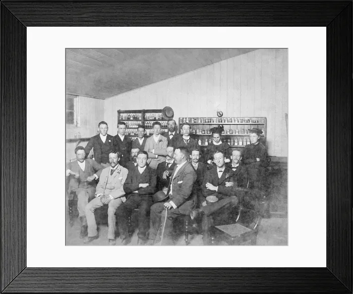 Framed Print : Group posed photo in classroom with Dr Wilton W.R. Love with Chemistry / Pharmacy students, 1894. Creator: Unknown Framed Print : Group posed photo in classroom with Dr Wilton W.R. Love with Chemistry / Pharmacy students, 1894. Creator: Unknown