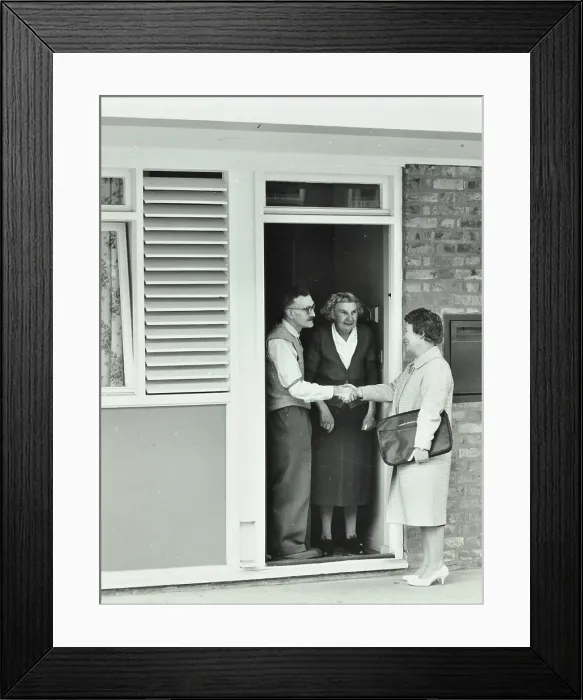 Framed Print : 16 Candy Street, Poplar, London: elderly couple greet Welfare Officer, 1962. Creator: Unknown Framed Print : 16 Candy Street, Poplar, London: elderly couple greet Welfare Officer, 1962. Creator: Unknown