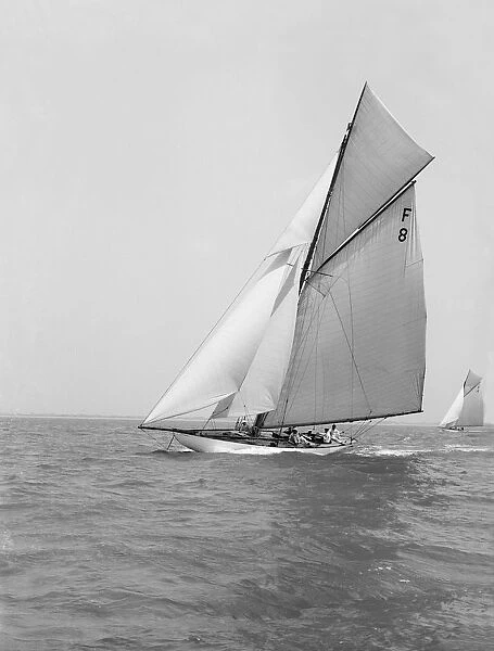 The 10 Metre class Pampero (F8) sailing close-hauled, 1914. Creator: Kirk & Sons of Cowes