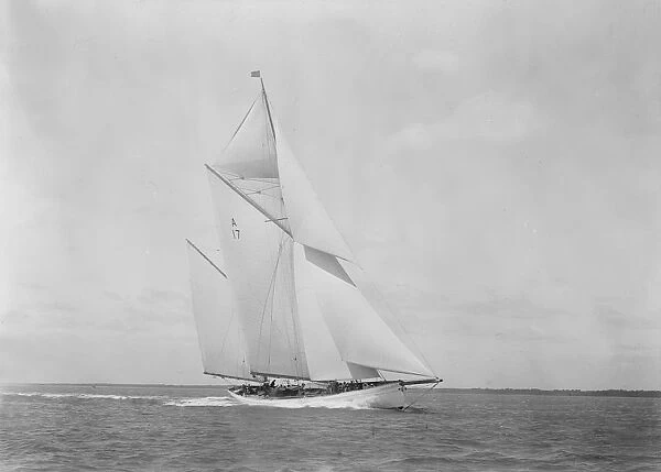The 118 foot racing yacht Cariad making good headway, 1933. Creator: Kirk & Sons of Cowes