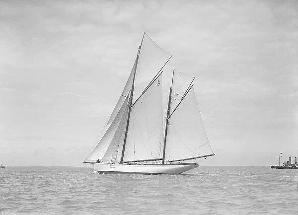 The 118 foot racing yacht Cariad sailing close-hauled, 1911. Creator: Kirk & Sons of Cowes