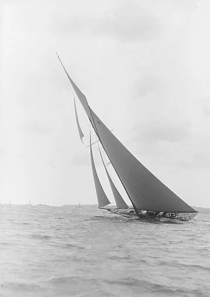 The 15 Metre class sailing yacht Paula III, heeling on windward leg, 1913. Creator