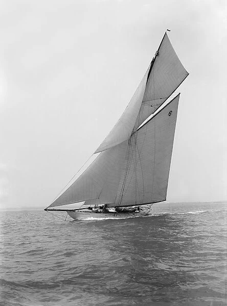The 15 Metre cutter Ma oona sailing close-hauled, 1914. Creator: Kirk & Sons of Cowes