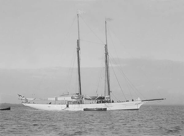 The 161 ton schooner Amphitrite at anchor, 1922. Creator: Kirk & Sons of Cowes