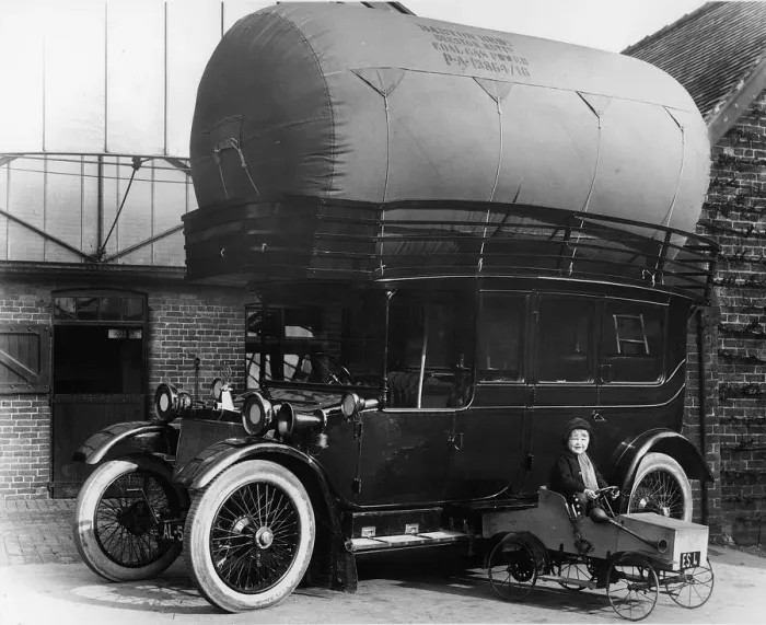 Framed Print : 1913 Lanchester with gas bag conversion and boy in pedal car. Creator: Unknown Framed Print : 1913 Lanchester with gas bag conversion and boy in pedal car. Creator: Unknown