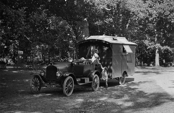 1921 Ford Model T with caravan. Creator: Unknown
