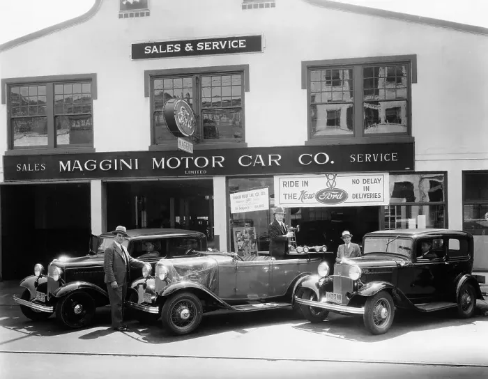 Framed Print : 1932 Ford V8 in front of a car showroom, (c1932?) Framed Print : 1932 Ford V8 in front of a car showroom, (c1932?)
