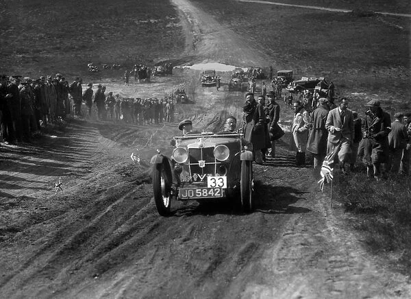 1932 MG J2 competing in a motoring trial, Bagshot Heath, Surrey, 1930s. Artist: Bill Brunell