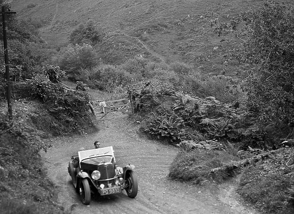1934 Triumph taking part in a motoring trial in Devon, late 1930s. Artist: Bill Brunell
