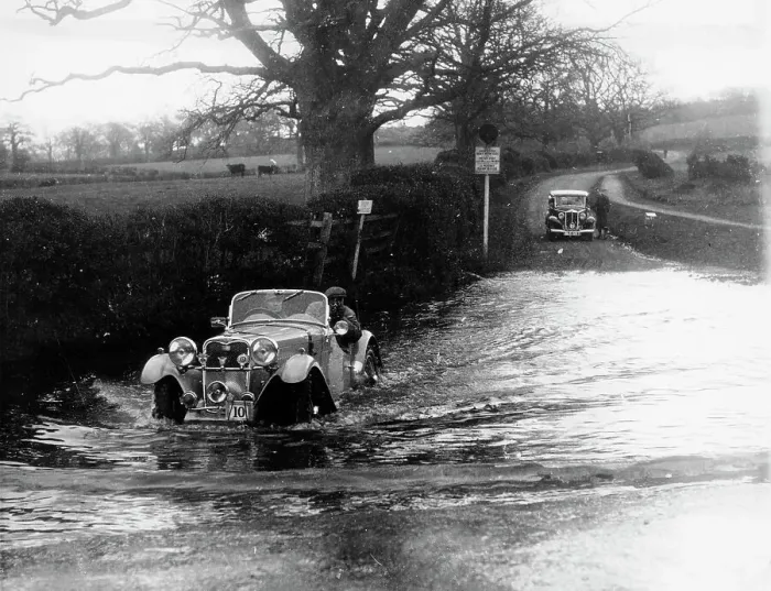 Framed Print : 1935 Singer 1.5 Litre Le Mans taking part in a water splash trial, (1935?) Framed Print : 1935 Singer 1.5 Litre Le Mans taking part in a water splash trial, (1935?)