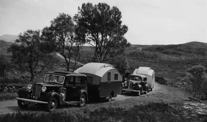 Framed Print : 1936 Austin Twenty with caravan and 1936 Oldsmobile Eight with caravan. Creator: Unknown Framed Print : 1936 Austin Twenty with caravan and 1936 Oldsmobile Eight with caravan. Creator: Unknown