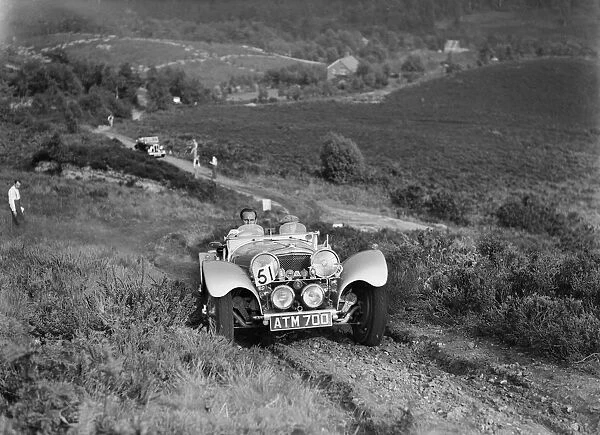 1936 Jaguar SS100 taking part in the NWLMC Lawrence Cup Trial, 1937. Artist: Bill Brunell
