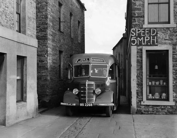 Framed Print : 1939-1952 Bedford OB coach in narrow street. Creator: Unknown Framed Print : 1939-1952 Bedford OB coach in narrow street. Creator: Unknown