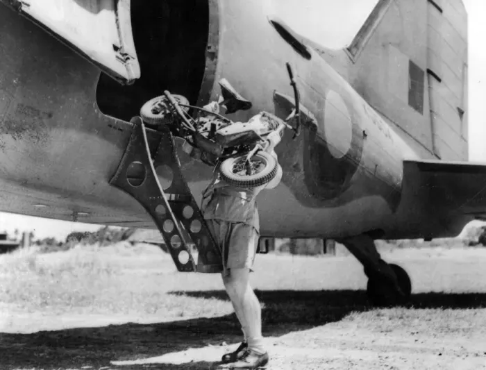 Framed Print : 1944 Welbike being placed on to military transport plane. Creator: Unknown Framed Print : 1944 Welbike being placed on to military transport plane. Creator: Unknown