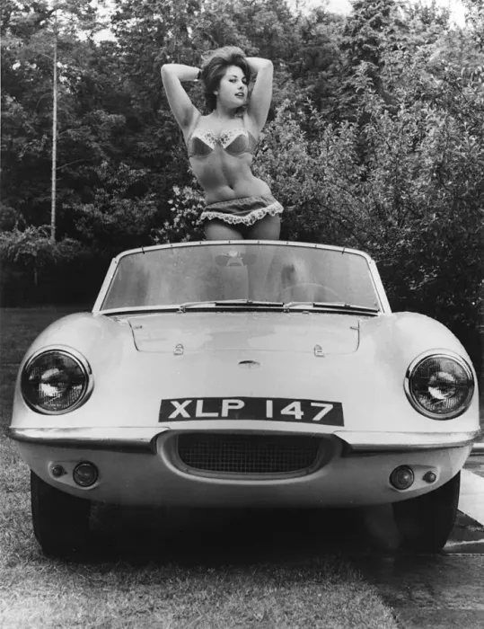 Framed Print : 1959 Elva with posing female model. Creator: Unknown Framed Print : 1959 Elva with posing female model. Creator: Unknown
