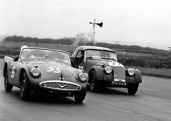 1961 Daimler SP250, Hon. B. Fielding and Morgan +4, Jones. At Silverstone. Creator: Unknown