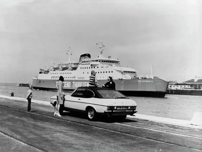 Framed Print : A 1974 Ford Capri on a quay, in front of a Townsend Thoresen car ferry, 1970s Framed Print : A 1974 Ford Capri on a quay, in front of a Townsend Thoresen car ferry, 1970s