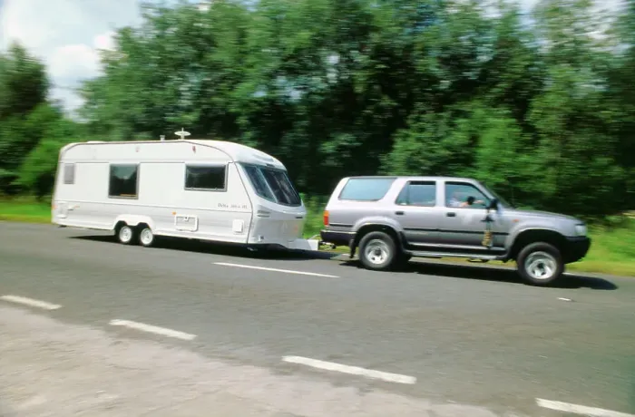 Framed Print : 1995 Toyota Landcruiser towing large caravan at speed Framed Print : 1995 Toyota Landcruiser towing large caravan at speed