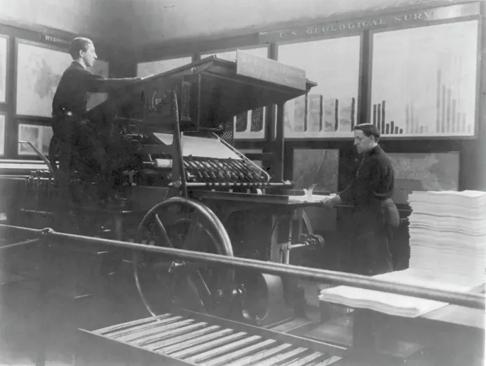 Framed Print : 2 men operating map printing press at U.S. Geol. Survey, (1900?). Creator: Frances Benjamin Johnston Framed Print : 2 men operating map printing press at U.S. Geol. Survey, (1900?). Creator: Frances Benjamin Johnston