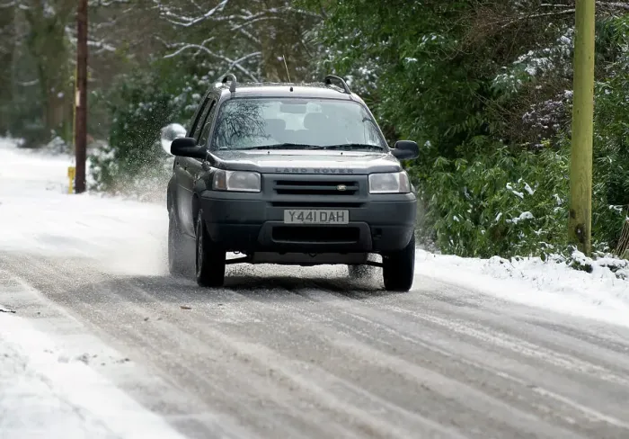 Framed Print : 2001 Land Rover Freelander driving on icy road Framed Print : 2001 Land Rover Freelander driving on icy road