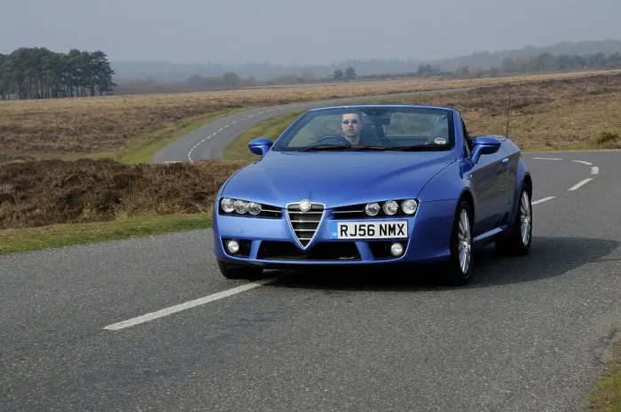 Framed Print : 2006 Alfa Romeo Spyder driving in New Forest Framed Print : 2006 Alfa Romeo Spyder driving in New Forest