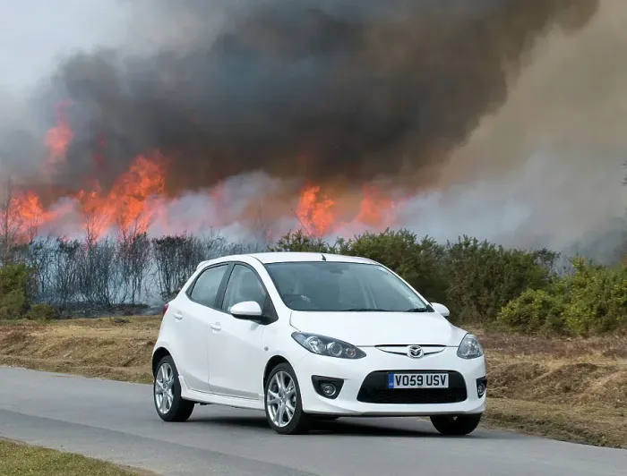 Framed Print : 2010 Mazda 2 Sport, controlled burning in New Forest Framed Print : 2010 Mazda 2 Sport, controlled burning in New Forest