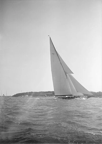 The 23-metre cutter Astra sailing close-hauled, 1934. Creator: Kirk & Sons of Cowes