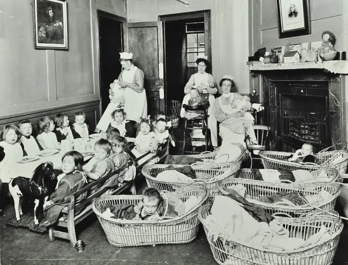 Framed Print : 30 Albury Street; Nursey at dinner time, Children in Baskets, 1911. Creator: Unknown Framed Print : 30 Albury Street; Nursey at dinner time, Children in Baskets, 1911. Creator: Unknown