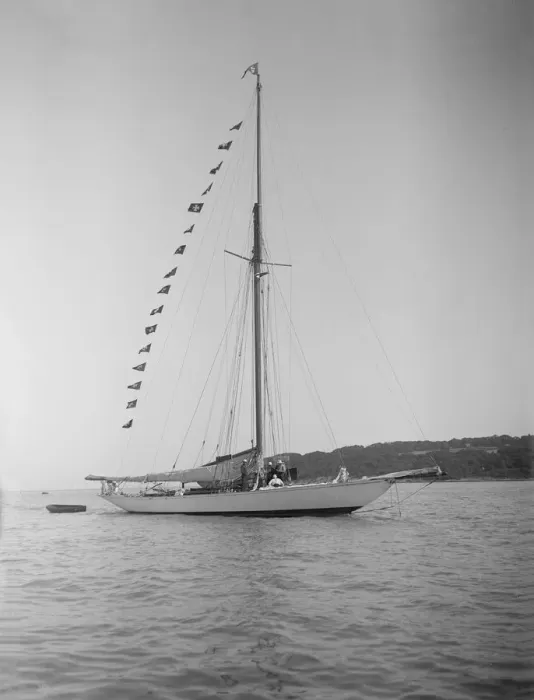 Framed Print : The 40-rater cutter Carina at anchor with flags, 1911. Creator: Kirk & Sons of Cowes Framed Print : The 40-rater cutter Carina at anchor with flags, 1911. Creator: Kirk & Sons of Cowes