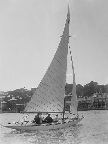 The 6 Metre class sailing yacht Reg, 1922. Creator: Kirk & Sons of Cowes